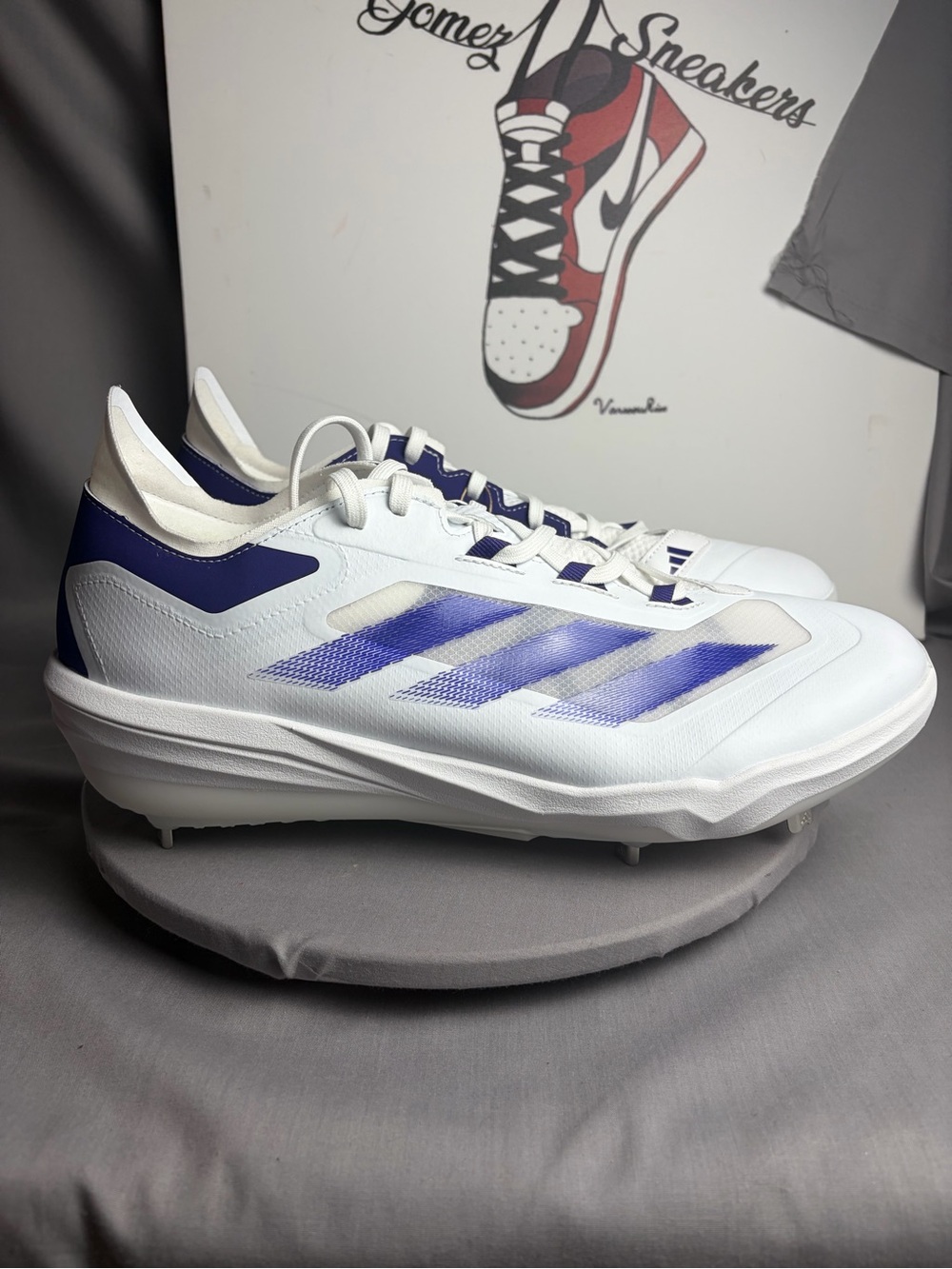 adidas Men’s White and Blue Baseball Cleats